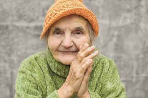 Portrait of a happy senior woman smiling at the camera.